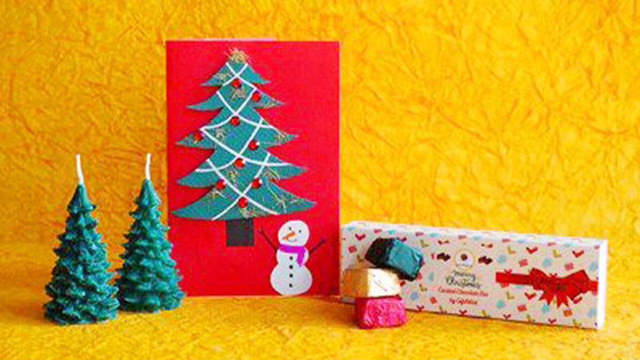 Giftabled has pen stands, notebooks and many other products made by people with disabilities and those who are disadvantaged. Their festive hamper has Christmas tree shaped candles, a card and chocolates 