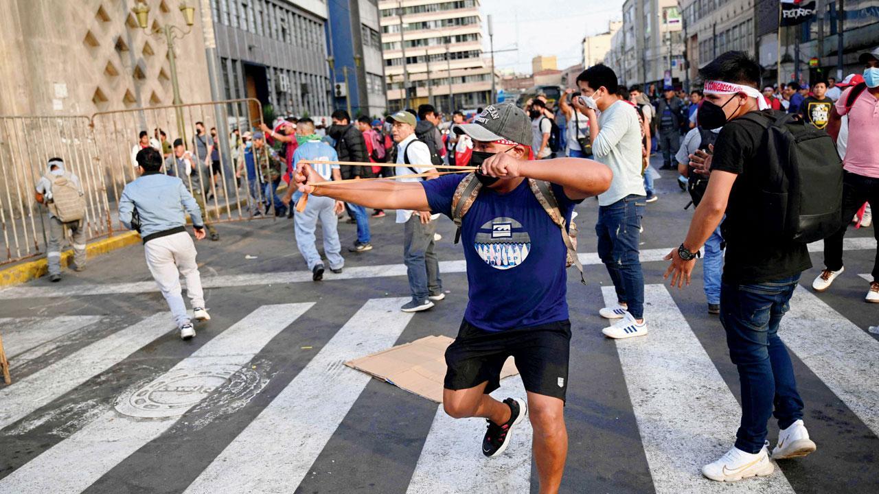 Peru’s new leader offers early election as seven die in protests