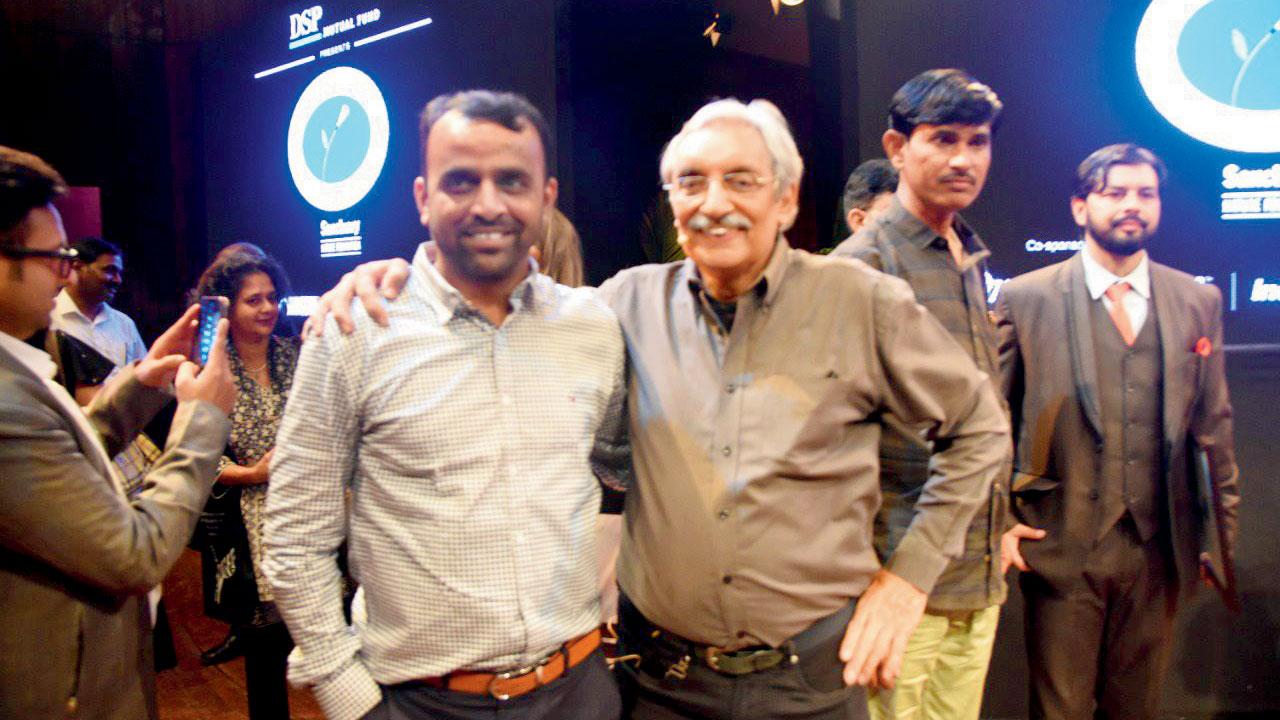 Ranjeet Jadhav, special correspondent, mid-day, with Sanctuary Nature Foundation founder Bittu Sahgal at the award ceremony. Pic/Sameer Markande