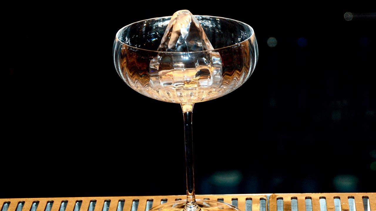 The diamond-shaped ice that Ghyar carved for a drink