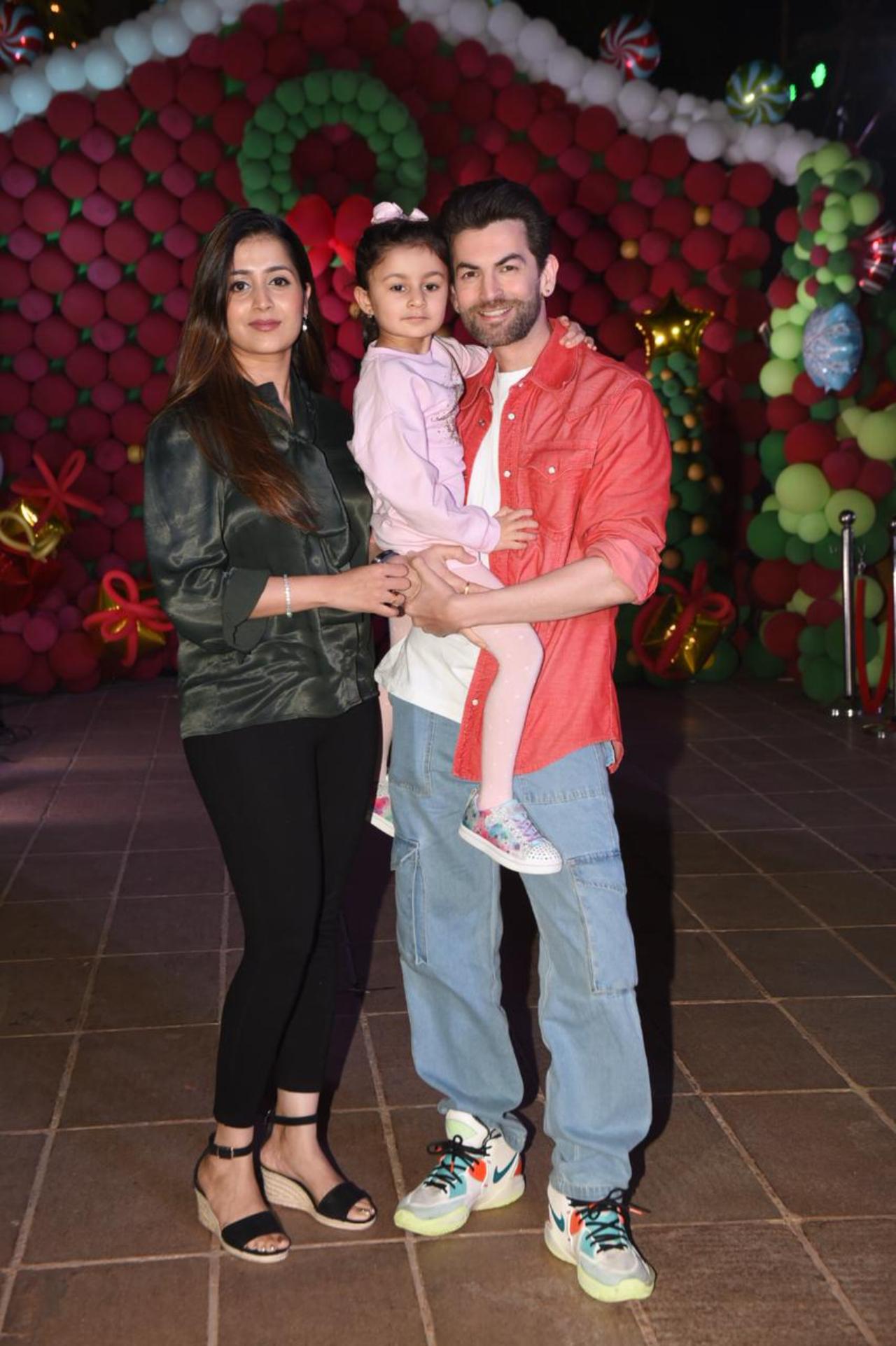 Actor Neil Nitin Mukesh opted for a red shirt over a white shirt and blue jeans. He arrived at the party along with his wife Rukmini Sahay and daughter Nurvi