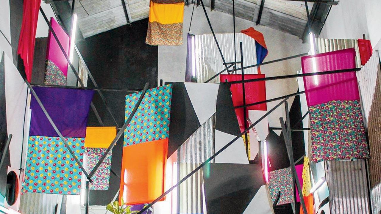 Commissioned by St+art, the Sassoon Dock Painting by Clemens Behr uses found materials. Pic Courtesy/Instagram