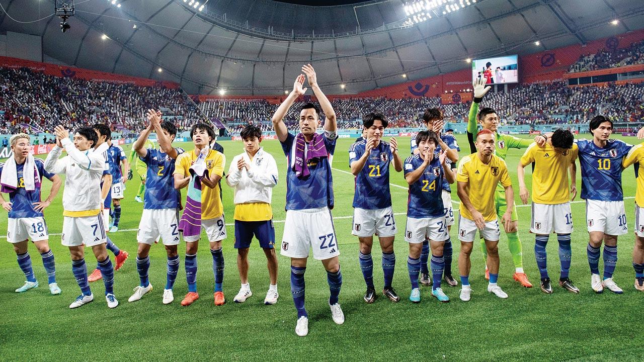 Japanese players acknowledge the crowd after their win over Spain on Thursday. Pics/Getty Images, AFP