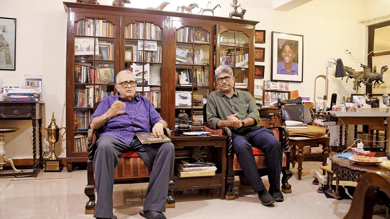 Saleem Ahmadullah and Vikas Dilawari swap local history notes at the latter’s home. Pics/Ashish Raje