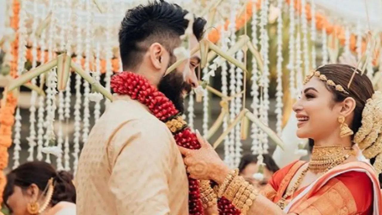 Mouni Roy and Suraj Nambiar's dreamy wedding happened in Goa on January 27, according to the South Indian and Bengali culture, and the bride and the groom aced both the looks with elan. Celebrities like Arjun Bijlani, Mandira Bedi, Jia Mustafa, and others attended the wedding. 
 