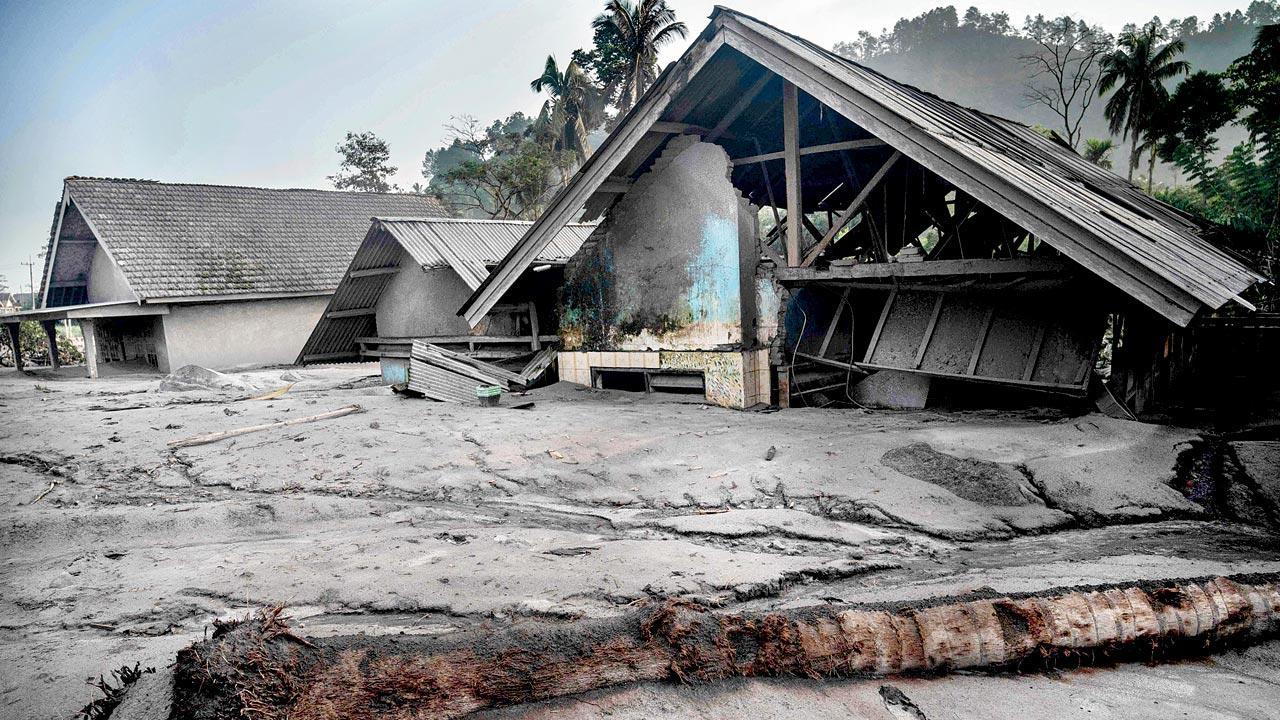 Mt. Semeru eruption buries homes, damages bridge