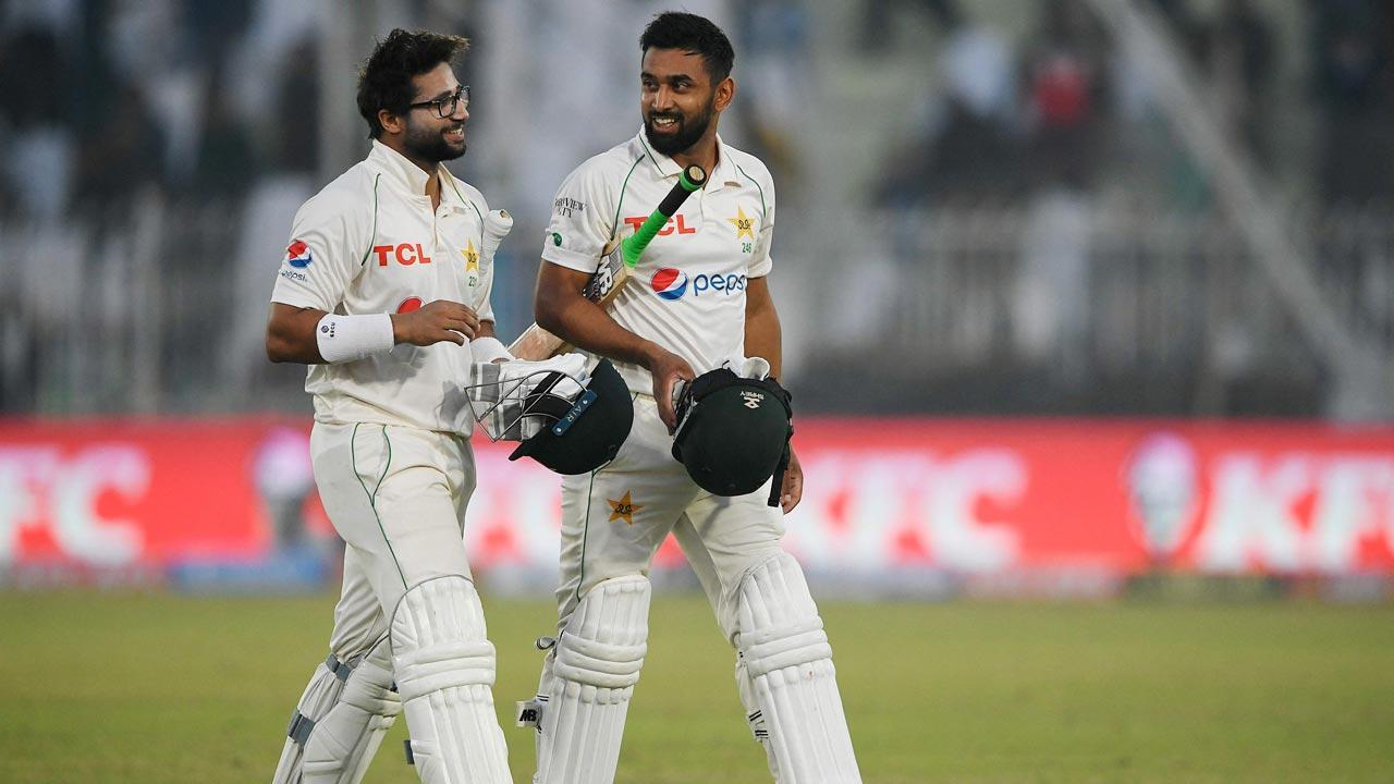 Runs galore on placid pitch as Pakistan openers hold firm