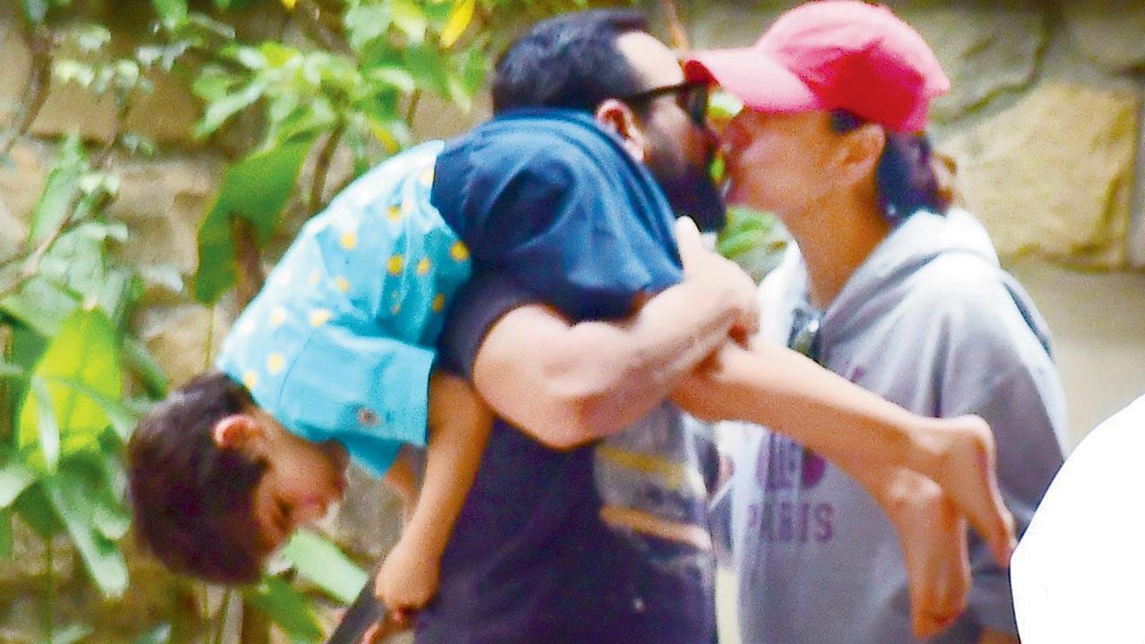 Up and about: Paps capture Saif and Kareena's PDA moment