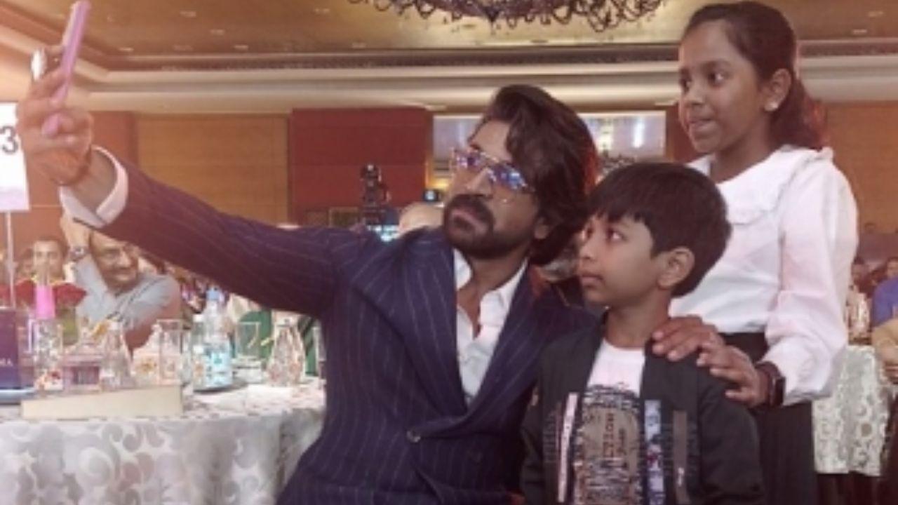 Ram Charan clicks selfies with children of Galwan martyr