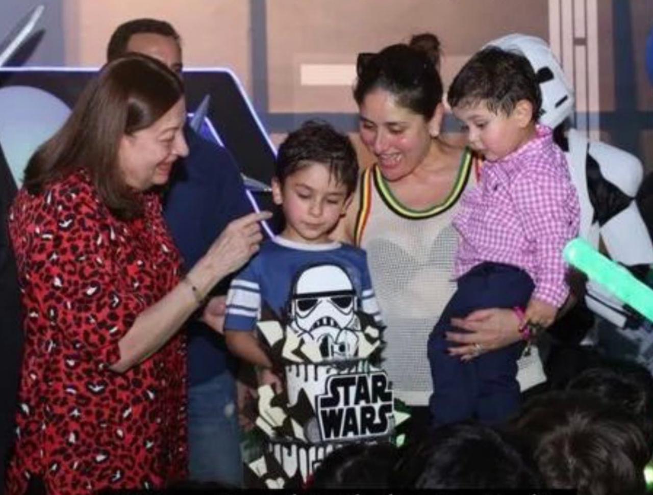 A sweaty Taimur cut his star wars cake along with mother Kareena and brother Jeh Ali Khan