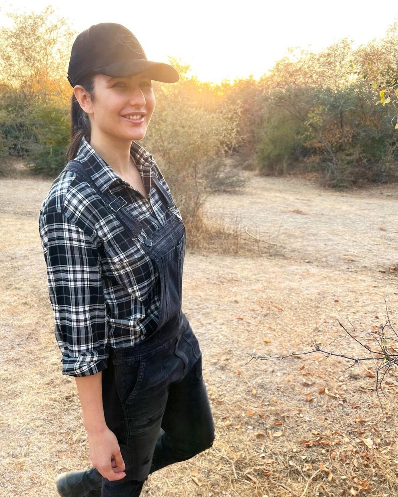 Katrina also shared a solo picture of herself. She is seen in a checked shirt and a black dungaree with a matching cap as she posed against the sun