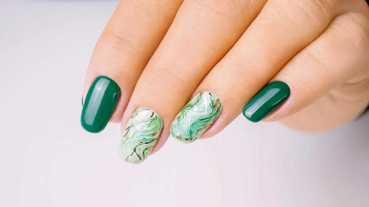 Pops of green on your nails can jazz up your look