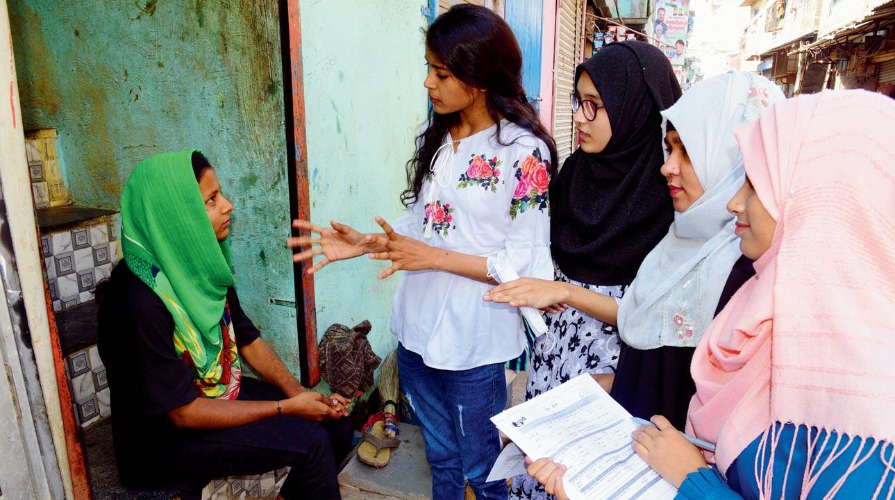 Alefiya, pursuing her first year D.Pharm from Thakur College, Kandivli, seen leading a survey on the lack of access to education to girls, in the slum settlement of Mandala