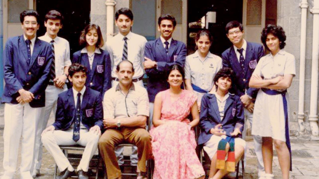 Isaacs (seated second from right) as the Wilson House headmistress. She joined as a substitute teacher in 1977 and rose up the ranks