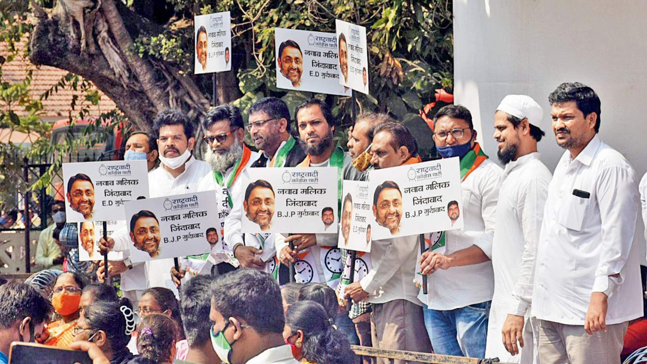 NCP supporters demonstrate against Malik`s arrest on Thursday. Pic/ANI