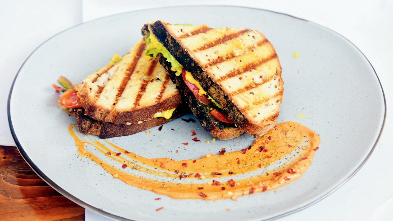 The pesto sandwich made with multi-grain bread, tomatoes, jalapenos and basil
