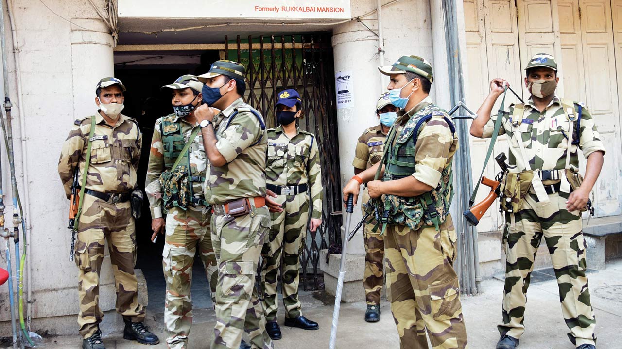 CRPF personnel outside Bilakhadi Chamber, Mazagaon, where the I-T searches were carried out on Friday. Pic/Pradeep Dhivar