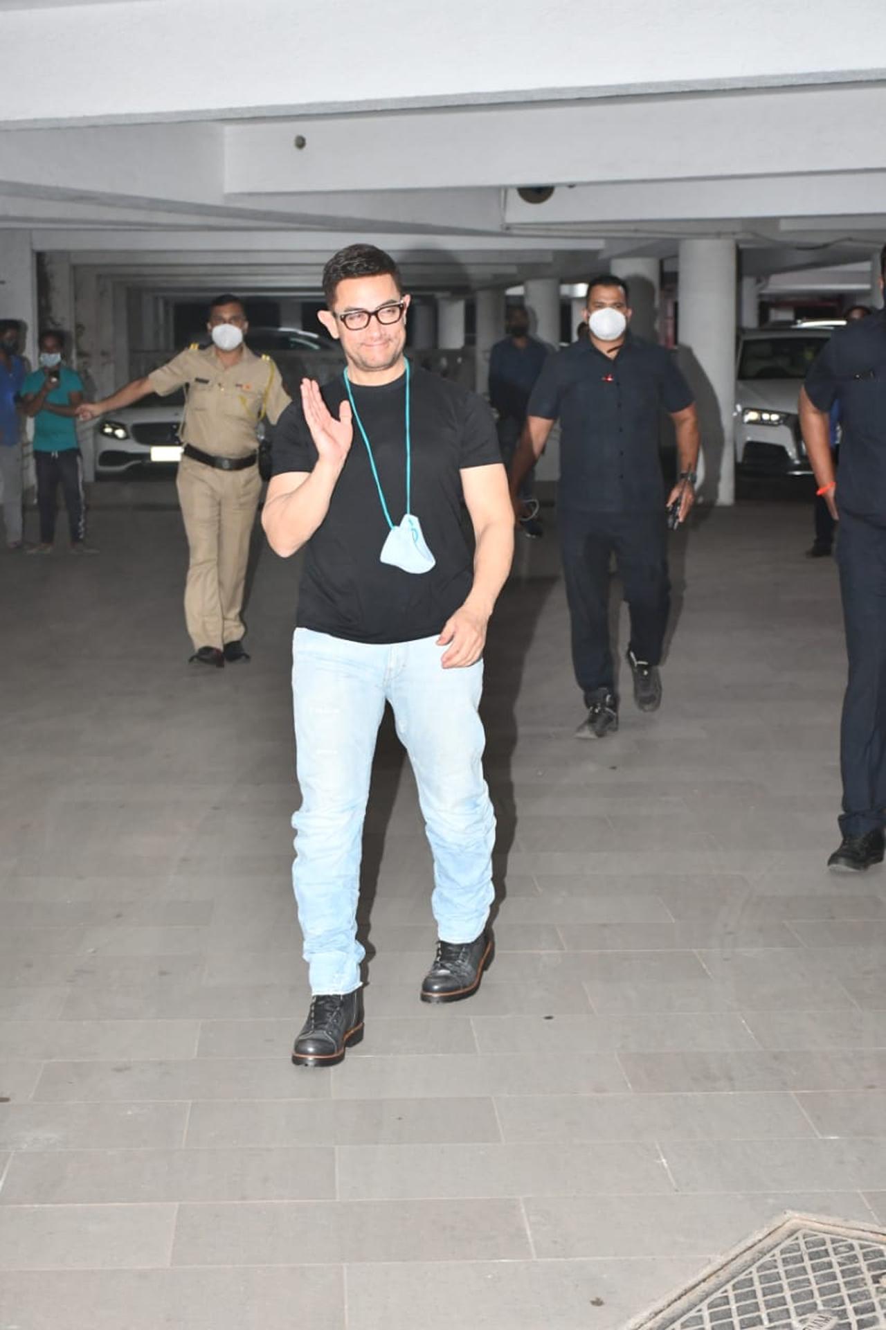 Aamir Khan waved at the shutterbugs as he showed up at his casual best outfit at the party.