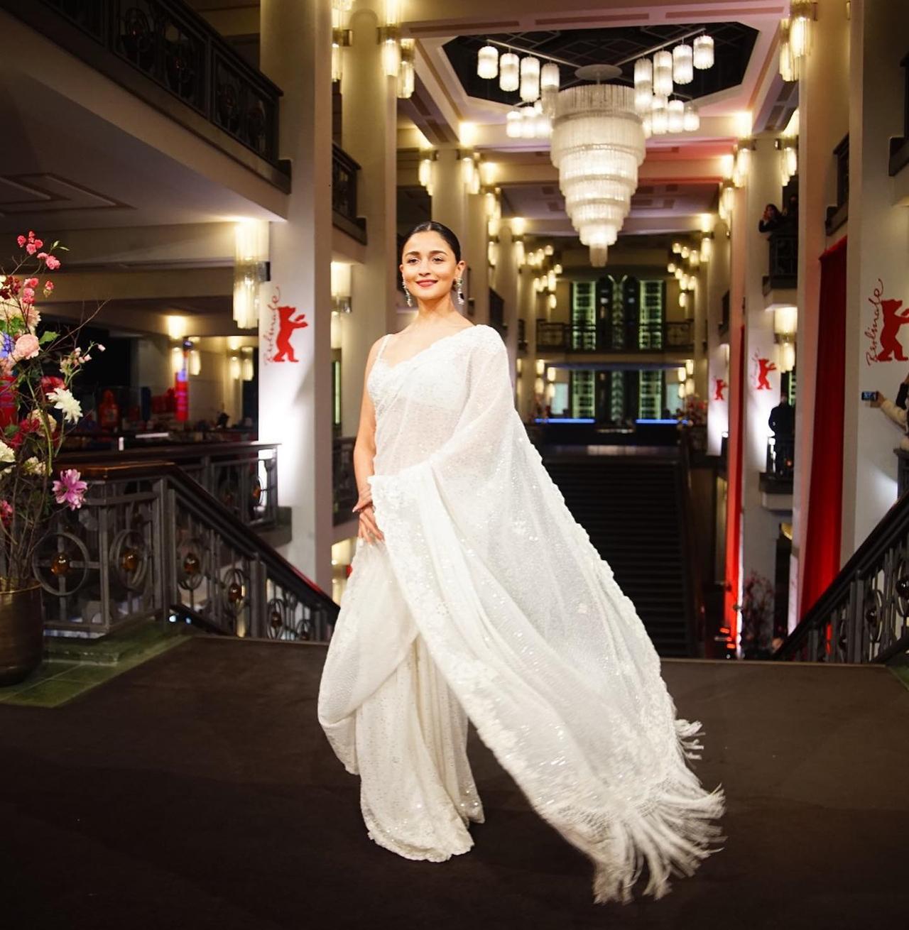 Alia Bhatt made an appearance in a pristine white saree by the popular designer duo in Berlin on Thursday at the screening of Sanjay Leela Bhansali's upcoming directorial at the event.