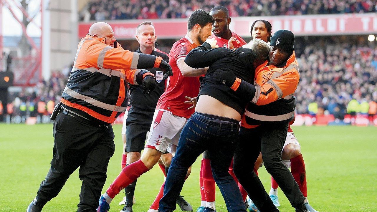 Fan arrested after attack on Forest players