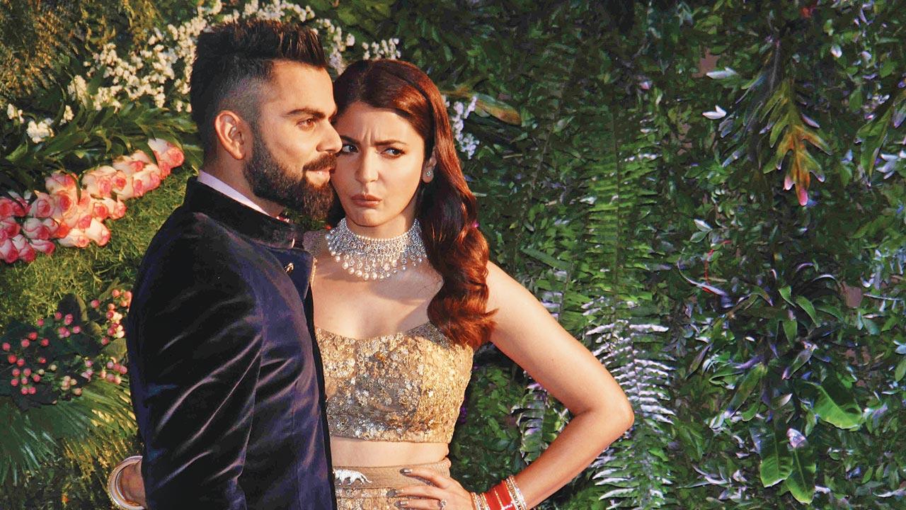 Virat Kohli and Anushka Sharma during their wedding reception at St Regis, Lower Parel, on December 26, 2017. Pics/Getty Images