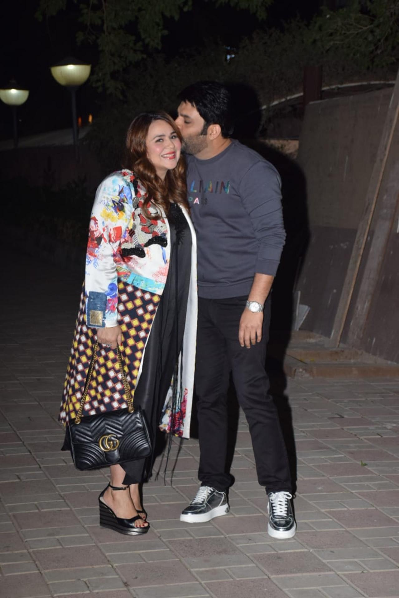 Kapil Sharma and Ginni Chatrath were caught in PDA by the paparazzi as they attended Deepika Padukone's digital debut Gehraiyaan's special screening.