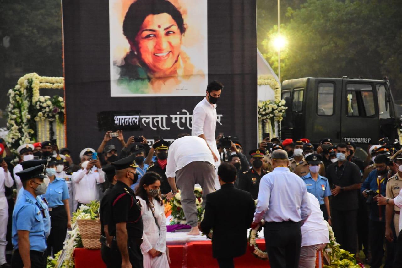 Singing legend Lata Mangeshkar was cremated with full state honours in Mumbai on Sunday. Shah Rukh Khan, Ranbir Kapoor, Shraddha Kapoor, Aamir Khan, Javed Akhtar among others were present at her funeral at Shivaji Park in the evening.