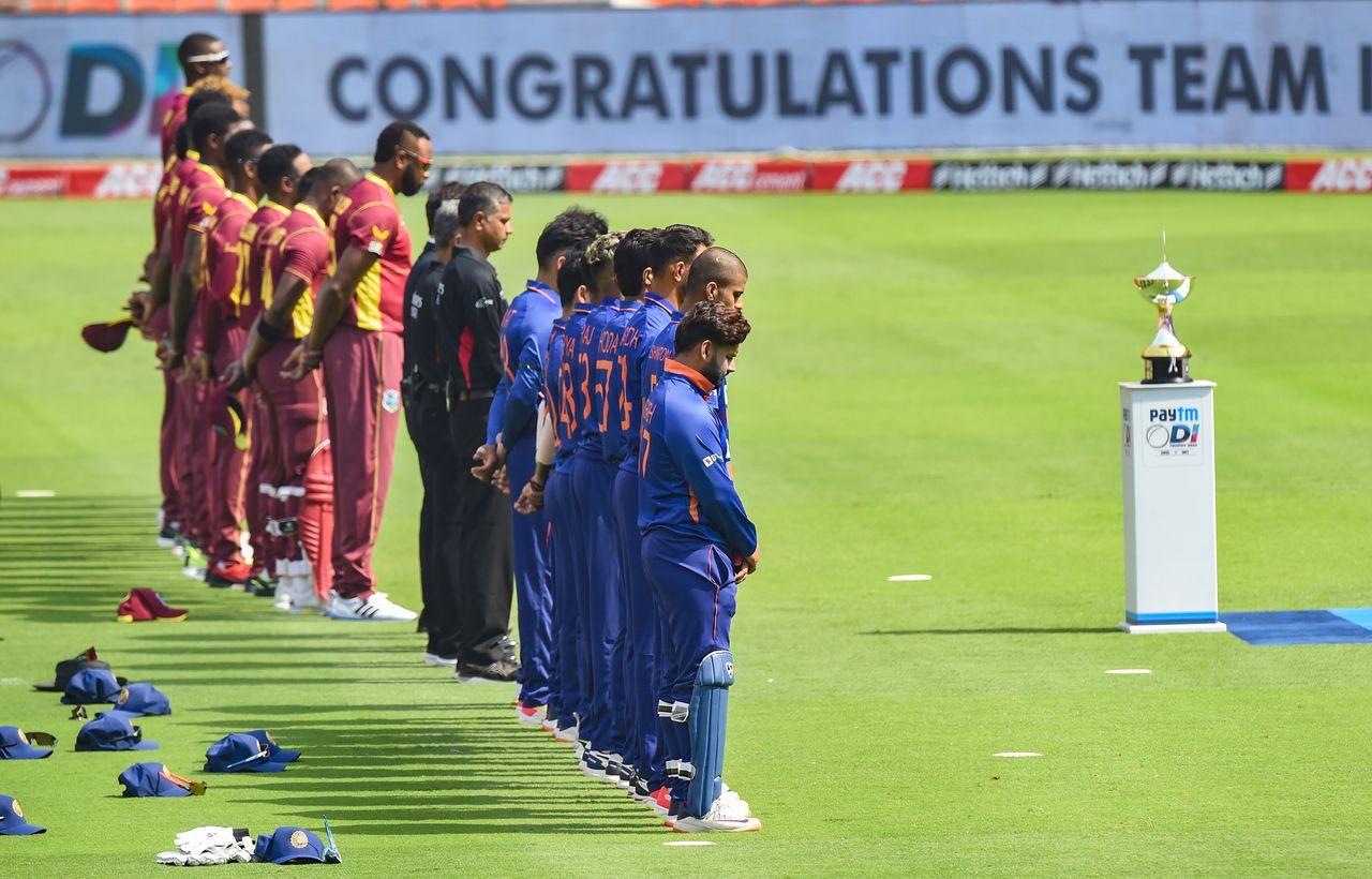 Players of India and the West Indies stand-in in silence to pay their respects to Bharat Ratna Lata Mangeshkar who passed away on Sunday morning before the first ODI cricket match between India and West Indies, at the Narendra Modi Stadium, in Ahmedabad. Pic/PTI