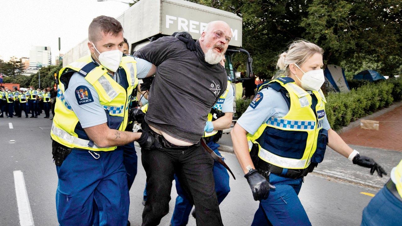Protester drives at N Zealand police