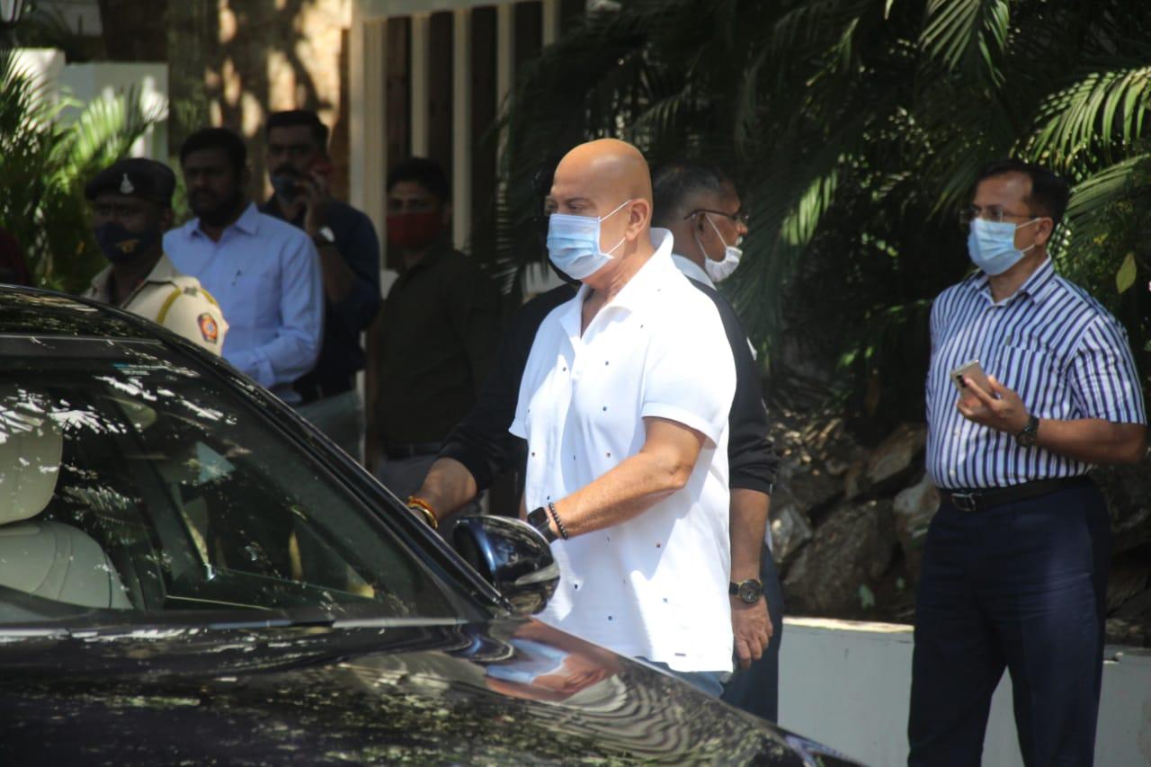 Actor-Director Rakesh Roshan snapped by the shutterbugs at Bappi Lahiri's residence.