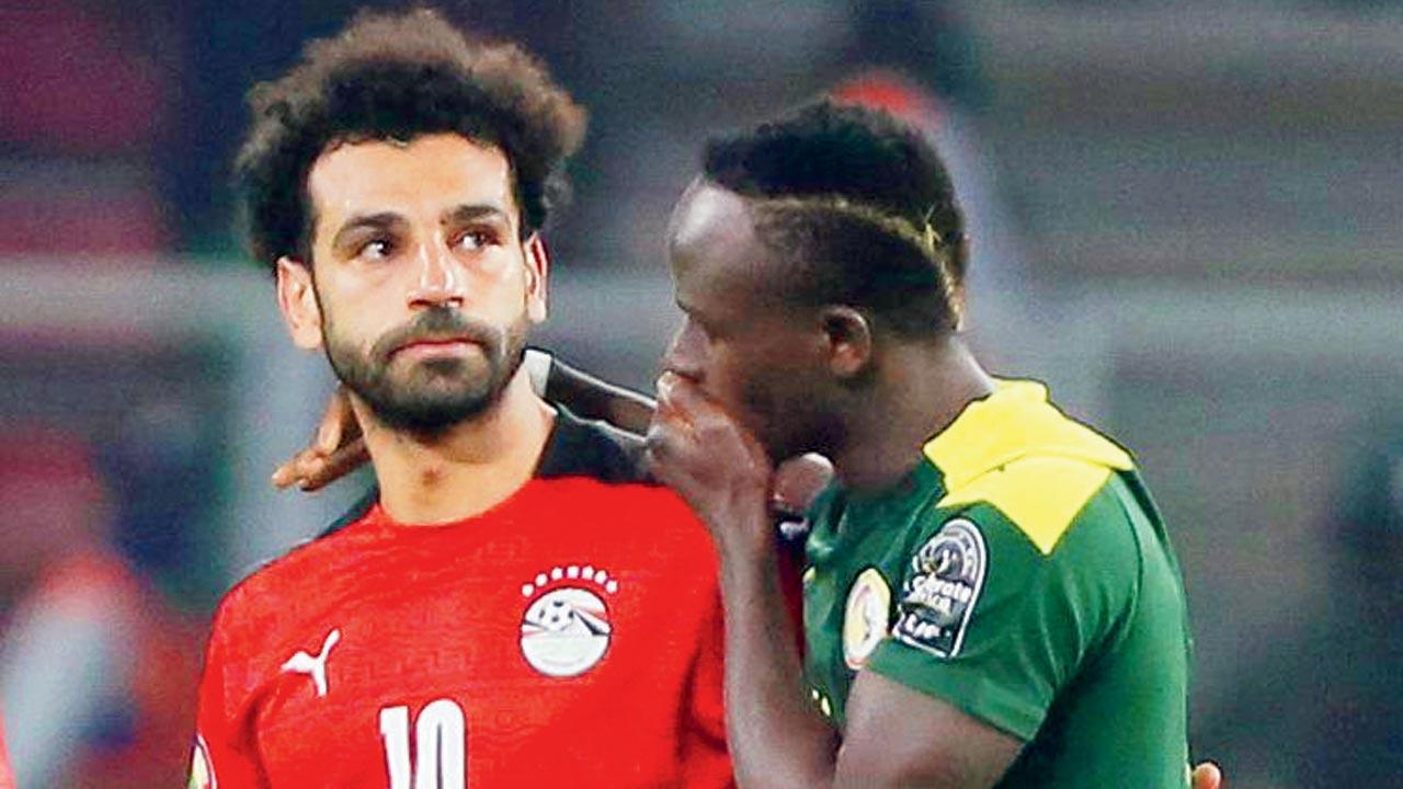 Senegal’s Sadio Mane (right) consoles Egypt’s Mohamed Salah on Sunday. Pic/Getty Images