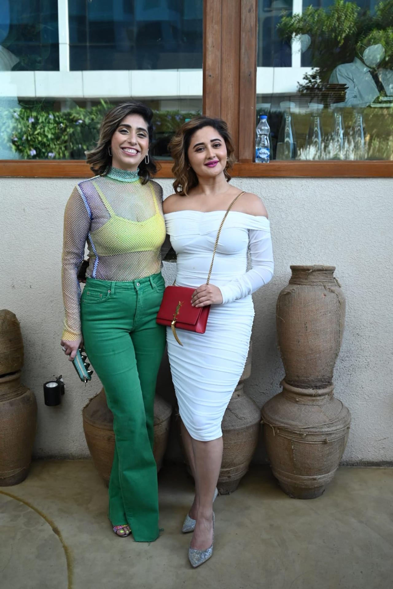 Rashami Desai and Neha Bhasin posed for the shutterbugs as they attended the celebration. Rashami was seen wearing a white outfit, whereas Neha stunned in a yellow crop top, green mesh and denim for the party.