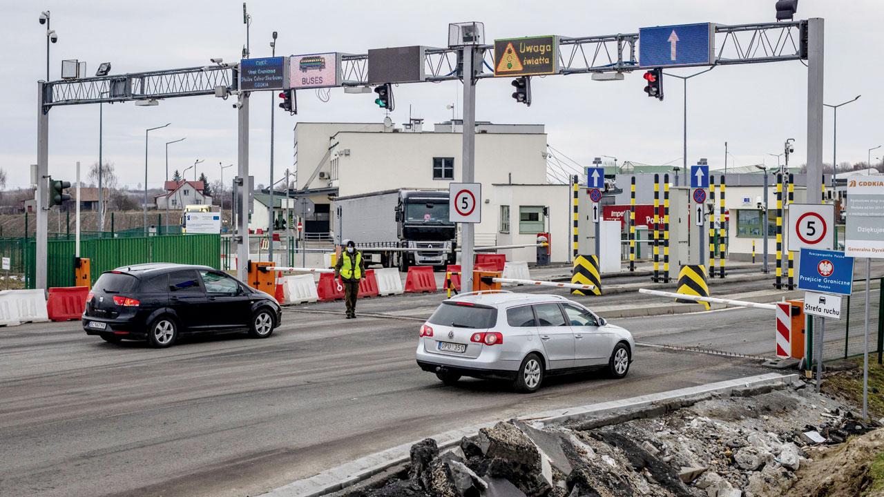 Students got vehicle for the last 3 km to Poland border. Pic/AFP