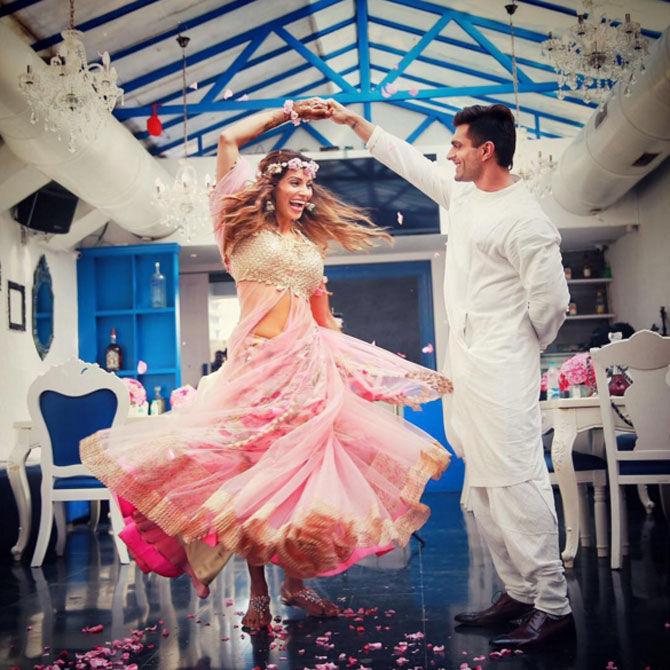 Bipasha Basu, who lovingly calls Karan her 'monkey', said, 'He is an all-heart human being. He is emotional and sensitive. He senses every mood of mine and tries to cheer me up always if I am angry or upset with anything in the world. He is the kind of person who makes me smile and laugh a lot, takes care of me... You don't see such sensitive people around in today's time but Karan is a person who is ruled by the heart, which is my most favourite thing about him.'
