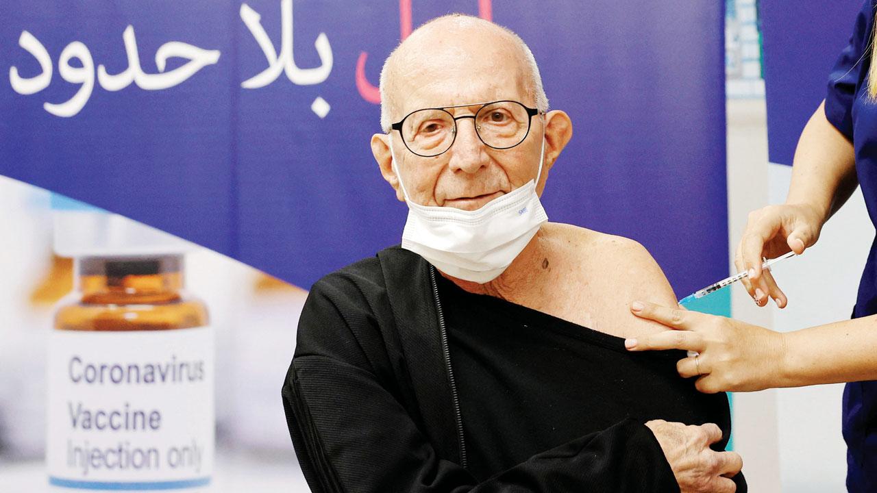 A man receives his fourth dose of the Pfizer-BioNTech vaccine at the Sheba Medical Center in Ramat Gan, Israel on Friday. Pic/AFP