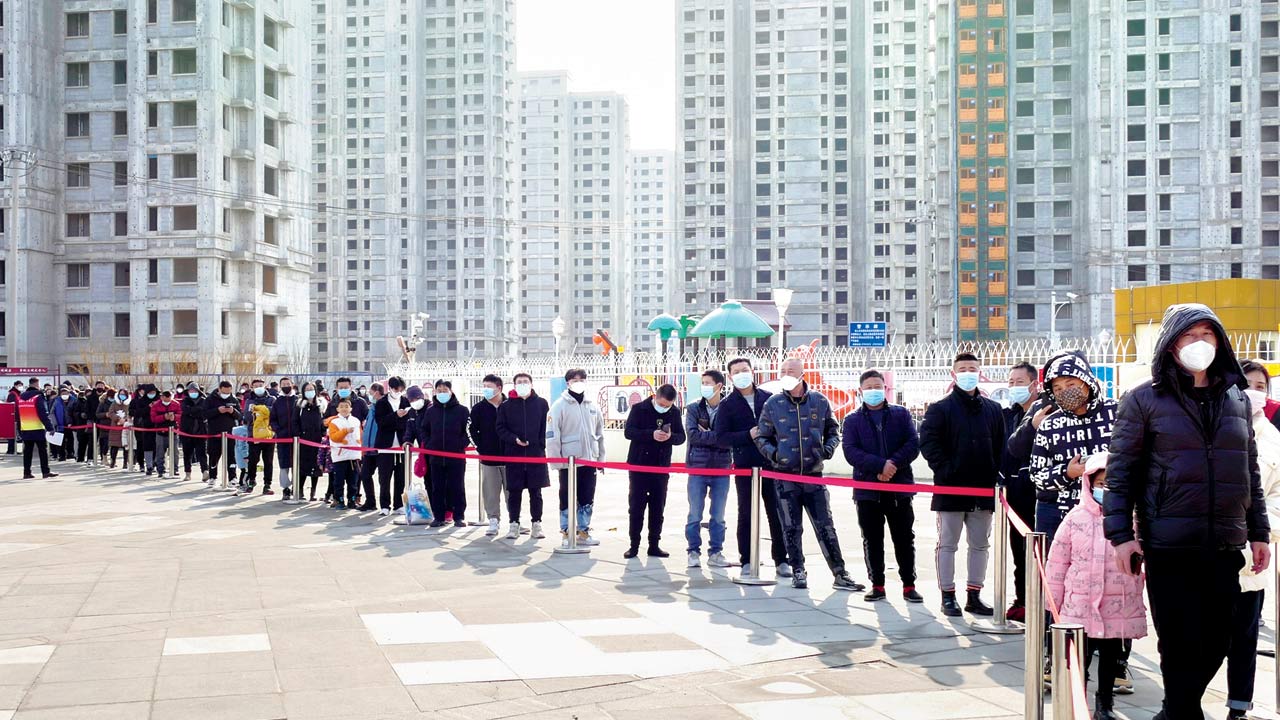 Residents line up for a coronavirus test during a mass testing of its 14 million citizens in north China’s Tianjin municipality on Sunday. Pic/AP
