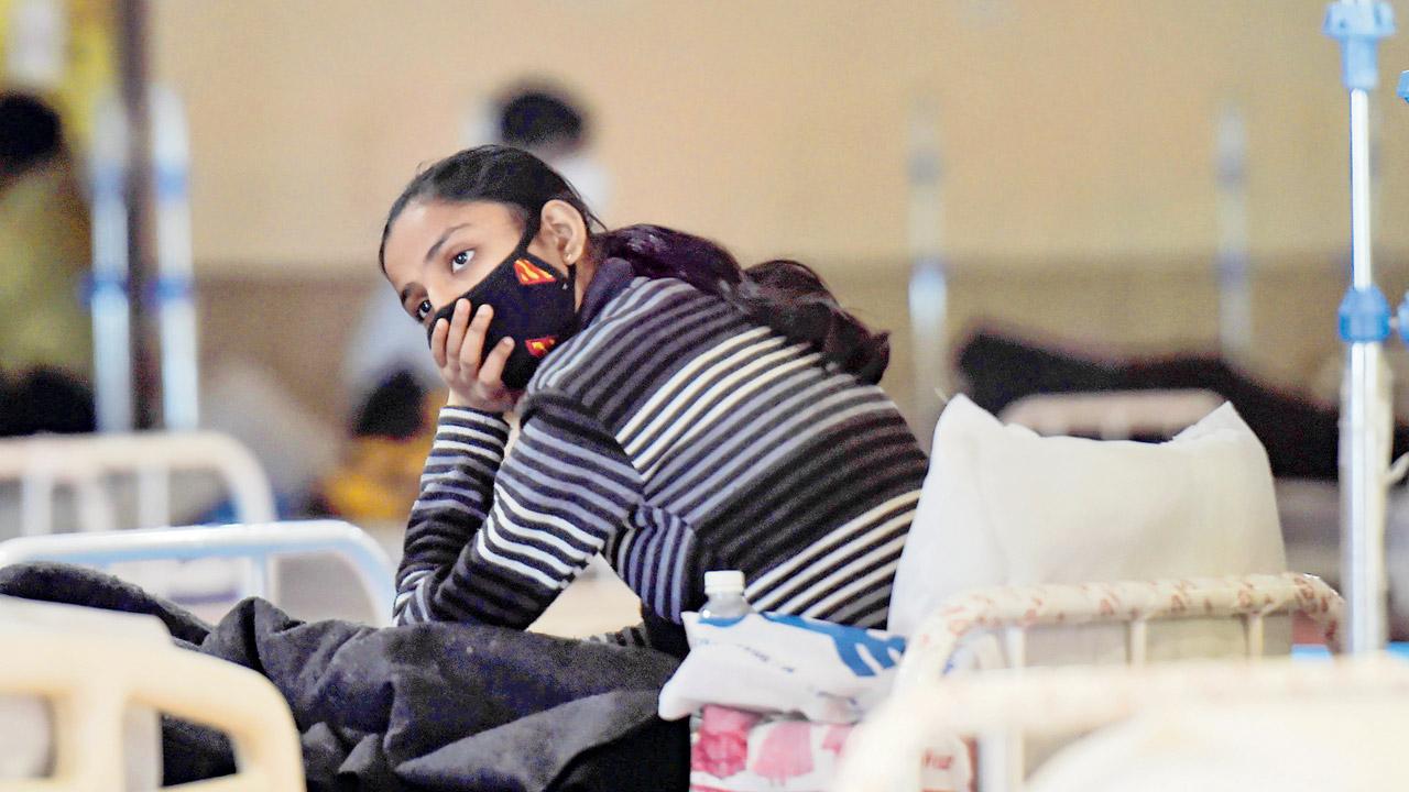 A patient inside a Covid care facility in New Delhi on Tuesday. Pics/PTI