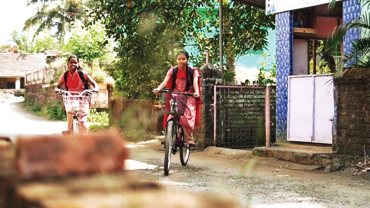 A still from a video for the initiative, showing a girl on a cycle in Alibaug
