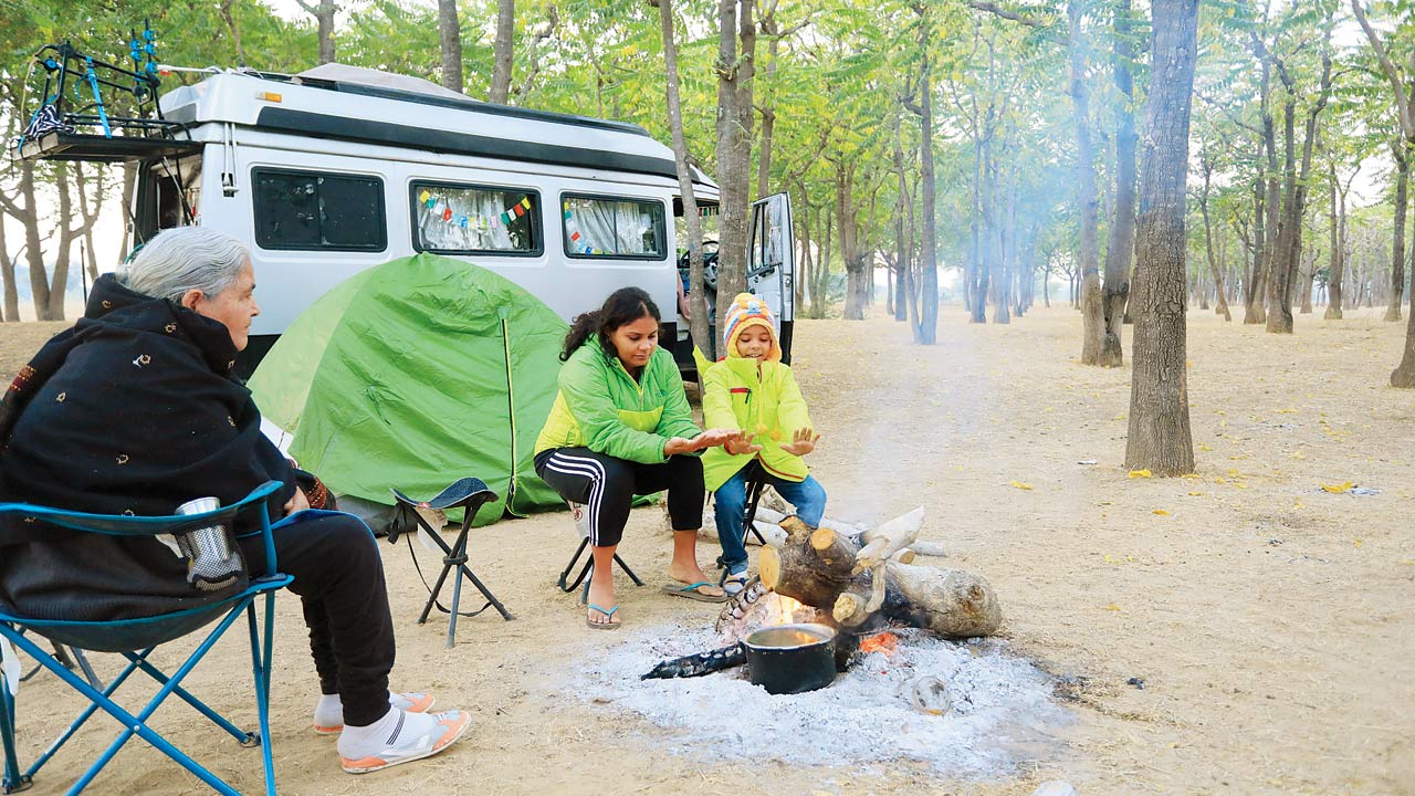 Vivek Sharma travels with his wife, two kids and his mother in his van