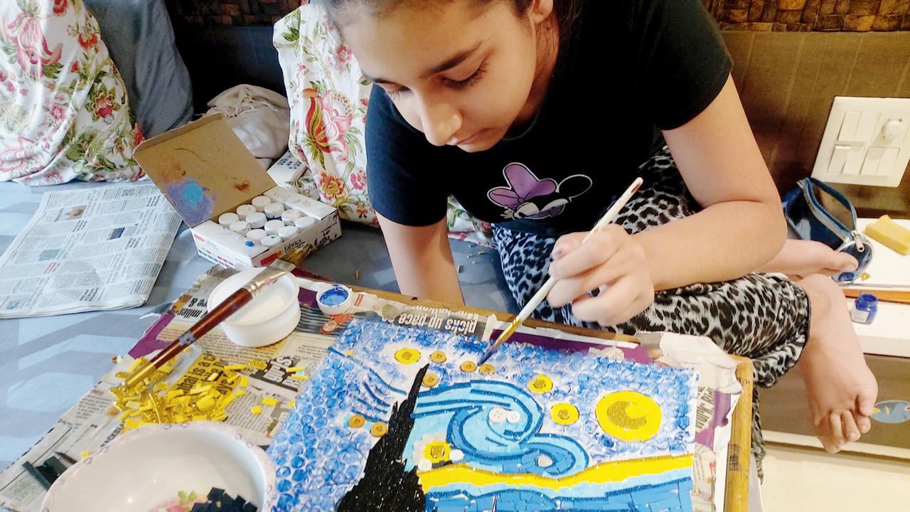 Krisha Vakharaia engaged in a painting