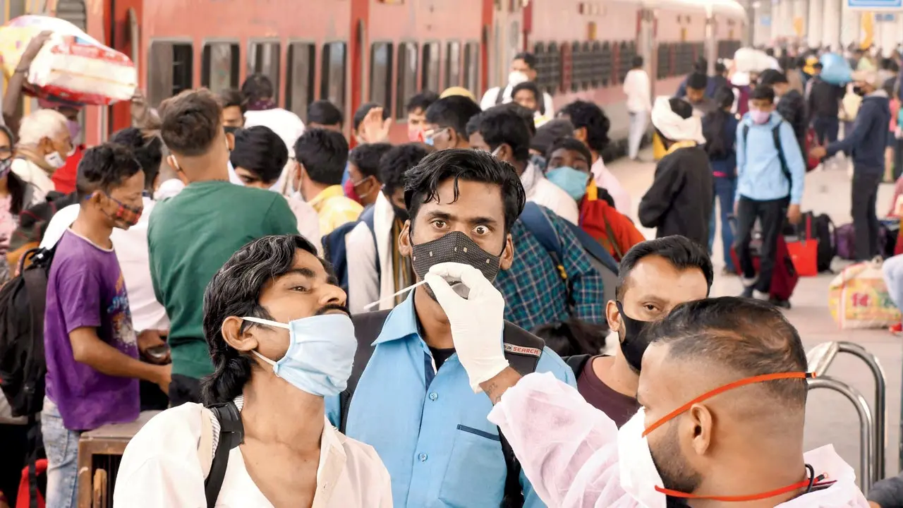An arriving passenger is tested on Monday at the Dadar station. Pic/Ashish Raje