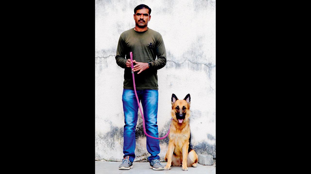 Maya with her handler Abaji Zite