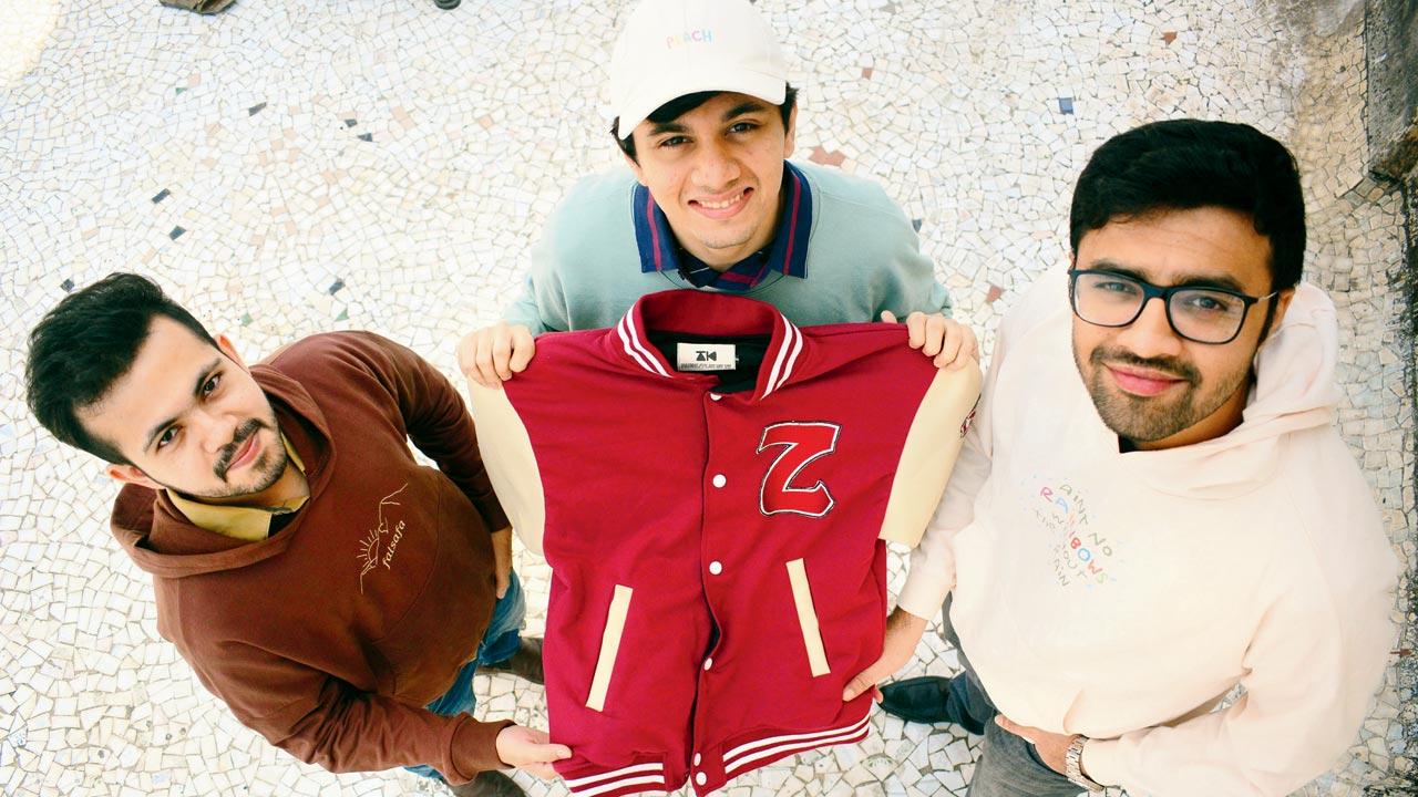 (From left) Jinay Vora, Milind Shah and Meet Gala started SuperClan, as they wanted to capitalise on the gap in the merchandising market. They handle Vishnu Kaushal and Tanzeel Khan. Pic/Sameer Markande