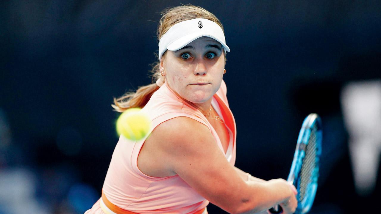 America’s Sofia Kenin returns to Madison Keys on Day One of the Australian Open at Melbourne Park yesterday. Pics/Getty Images