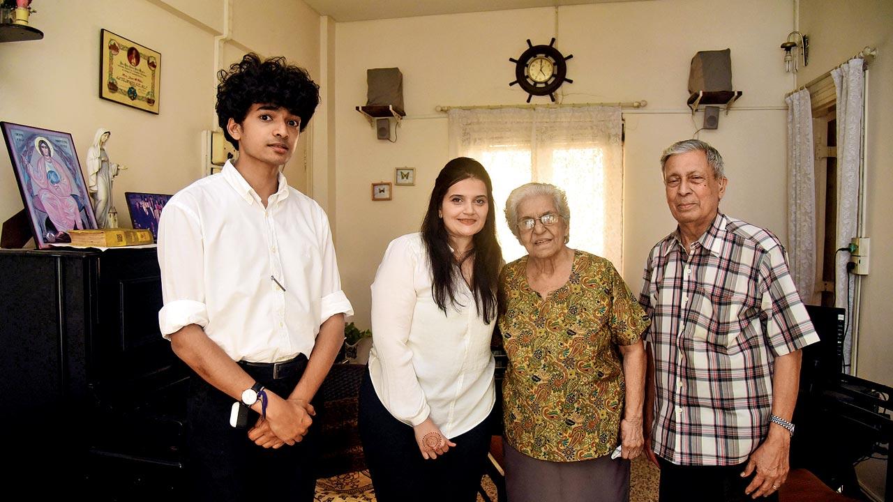Shantanu Naidu, founder of The GoodFellows, along with GoodFellow Gargi Sandu, and grandpals Arthur and Joyce D’Mello at their residence in Mahim. Arthur, a veteran legal expert, had signed up for the beta pilot of the project, seeking a lawyer who he could share his ideas with. Pic/Shadab Khan 