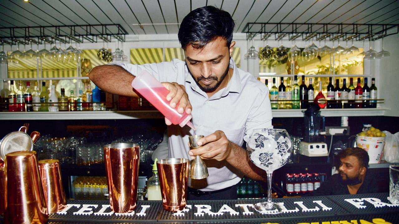 Vasant Shetty, bar manager at Donna Deli, prepares the Roselet. Pic/Atul Kamble