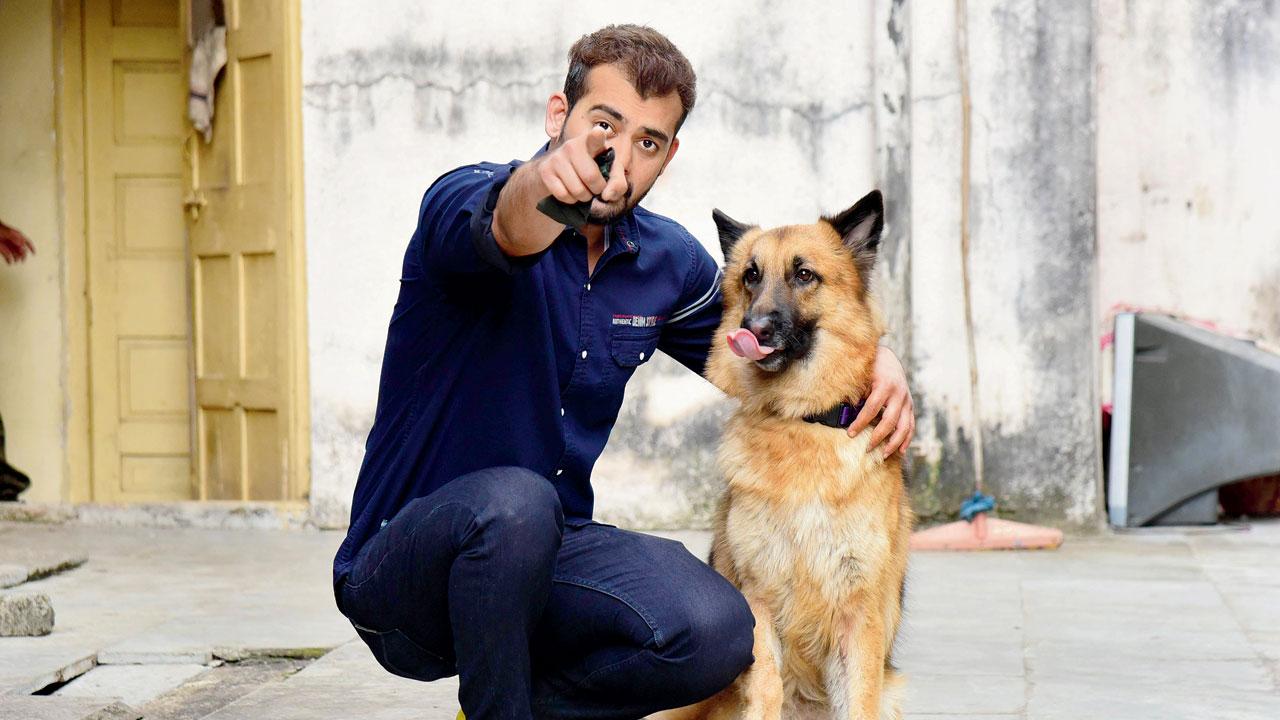 Whiskey with his handler Kiran Bairagi