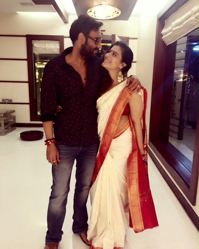 Ajay Devgn and Kajol gaze into each other's eyes in this romantic picture