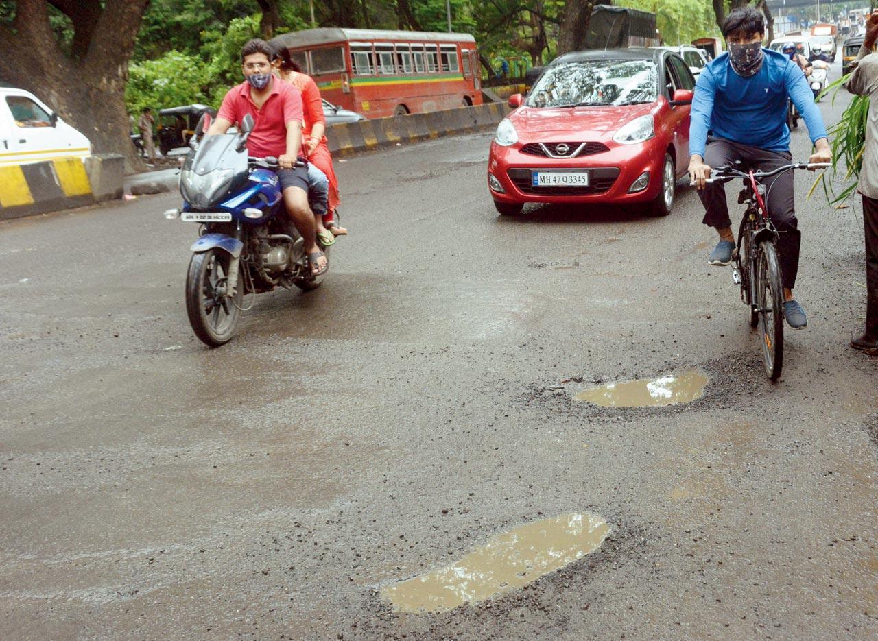 Potholes in Aarey colony in September 2021. File pic/Satej Shinde