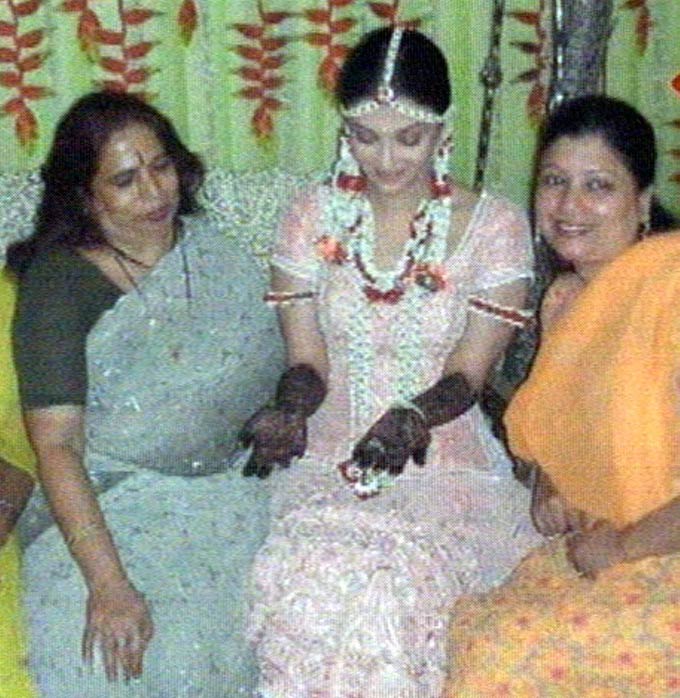 Aishwarya Rai Bachchan at her mehendi ceremony. Click on next to see more pictures of the Bollywood power couple